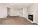 Spacious living room with a fireplace, ideal for gatherings and comfortable everyday living at 350 Dailey Mill Rd, Mcdonough, GA 30253