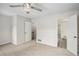 Bedroom featuring carpeted floors and multiple entrances to other rooms at 4098 Charlotte Se Ct, Smyrna, GA 30082