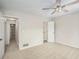 Spacious carpeted bedroom offering access to the hallway and closet at 4098 Charlotte Se Ct, Smyrna, GA 30082