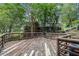 Large wooden deck featuring multiple levels, perfect for outdoor entertaining and relaxation at 4098 Charlotte Se Ct, Smyrna, GA 30082