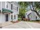 Well-maintained townhome with a private entrance, mature trees, and a serene outdoor space at 4098 Charlotte Se Ct, Smyrna, GA 30082
