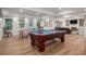 Spacious game room featuring a pool table and ping pong table, perfect for entertaining at 351 Prestbury Ct, Suwanee, GA 30024
