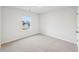 Neutral bedroom with large window for natural light at 3623 Squires Park Ln, Loganville, GA 30052