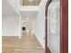 Bright entryway showcasing light wood floors and an open floor plan with views to the living spaces at 3623 Squires Park Ln, Loganville, GA 30052