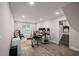 Finished basement with wood-look floors, a window, and a flexible space for recreation or hobbies at 6176 Hyde Park Ln, Lithonia, GA 30058