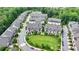 Community aerial view showcasing well-maintained townhomes and lush green spaces at 6399 Lucent Ln, Atlanta, GA 30328