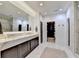 This bathroom features marble countertops, tile floors, and a spacious glass shower at 6399 Lucent Ln, Atlanta, GA 30328