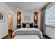 Stylishly decorated bedroom featuring modern decor and a comfortable bed at 6399 Lucent Ln, Atlanta, GA 30328