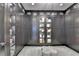 Walk in closet with custom cabinetry, open shelving, and ample storage space at 6399 Lucent Ln, Atlanta, GA 30328
