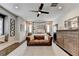Spacious main bedroom with a seating area, decorative mirror, and large windows with shutters at 6399 Lucent Ln, Atlanta, GA 30328