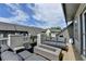 Relaxing rooftop deck featuring comfortable seating and a modern fire pit with neighborhood views at 6399 Lucent Ln, Atlanta, GA 30328