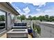Cozy outdoor patio with comfortable seating, a modern fire pit, and scenic neighborhood views at 6399 Lucent Ln, Atlanta, GA 30328