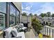 Relaxing patio with comfortable seating, a grill, and serene neighborhood views at 6399 Lucent Ln, Atlanta, GA 30328