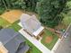 An aerial view of the home highlighting its location, landscaping, and exterior features at 2214 Meador Ave Se, Atlanta, GA 30315
