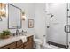 Elegant bathroom featuring glass shower, and a stylish vanity with modern fixtures at 2214 Meador Ave Se, Atlanta, GA 30315