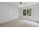 Neutral bedroom with a closet and natural lighting at 2214 Meador Ave Se, Atlanta, GA 30315