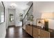 Welcoming foyer with hardwood floors, staircase, and natural light from the front door at 2214 Meador Ave Se, Atlanta, GA 30315