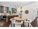 Modern eat-in kitchen featuring ample counter space, elegant lighting, and an open layout at 2214 Meador Ave Se, Atlanta, GA 30315