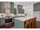 Stylish kitchen with stainless steel appliances, a center island, and green cabinetry at 2214 Meador Ave Se, Atlanta, GA 30315