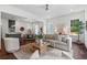 Spacious living room featuring hardwood floors, neutral decor, and an open floor plan at 2214 Meador Ave Se, Atlanta, GA 30315