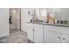 Modern bathroom with double vanity sinks and lots of counter space at 2304 Pelham Pass, Dacula, GA 30019