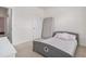 Comfortable bedroom with a bed, a mattress propped against the wall and closet at 2304 Pelham Pass, Dacula, GA 30019