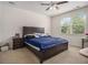 Comfortable bedroom with ceiling fan, closet, and natural light from the window at 2304 Pelham Pass, Dacula, GA 30019