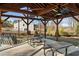 Outdoor pavilion featuring picnic tables, ceiling fans, and convenient seating for entertaining at 5615 Hislop Ln # 82, Mableton, GA 30126