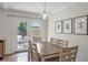 Bright dining room with wooden table, access to outdoor patio, and elegant decor, ideal for gatherings at 136 Peachtree Memorial Nw Dr # Ri2, Atlanta, GA 30309