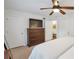 This bright primary bedroom features white walls, ceiling fan, and carpeting at 136 Peachtree Memorial Nw Dr # Ri2, Atlanta, GA 30309