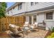 Cozy brick patio featuring stylish outdoor seating and a charming brick wall, perfect for relaxing outdoors at 136 Peachtree Memorial Nw Dr # Ri2, Atlanta, GA 30309