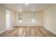 Finished basement includes vinyl floors and multiple windows at 300 Twin Tendrils Sw, Atlanta, GA 30331