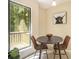 Charming breakfast nook featuring natural light, stylish seating, and view of outdoor deck at 300 Twin Tendrils Sw, Atlanta, GA 30331