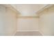Walk-in closet providing ample space for storage with shelving and ample hanging space at 300 Twin Tendrils Sw, Atlanta, GA 30331