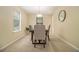 Bright dining room featuring neutral tones and stylish decor at 300 Twin Tendrils Sw, Atlanta, GA 30331