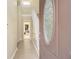 Bright entryway featuring tile flooring and staircase to the upper level at 300 Twin Tendrils Sw, Atlanta, GA 30331