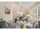 Spacious living room with bright windows, comfortable seating, and modern decor at 300 Twin Tendrils Sw, Atlanta, GA 30331