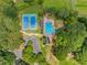 Aerial shot of community amenities including tennis courts, pool, parking, and green spaces at 507 Wintergreen Way, Canton, GA 30115