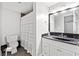 Modern bathroom with a new vanity, toilet, and a sleek shower curtain at 507 Wintergreen Way, Canton, GA 30115