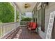 Inviting front porch with chairs and 'Welcome' sign at 507 Wintergreen Way, Canton, GA 30115