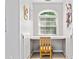 Bright office nook with a large window, built-in storage, and a comfortable seating area at 507 Wintergreen Way, Canton, GA 30115