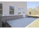 The home features a concrete back patio, providing a great space to relax outside at 913 Agate Ln, Lawrenceville, GA 30043