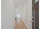 Bright entryway with light wood flooring and a clear view into the living space at 913 Agate Ln, Lawrenceville, GA 30043