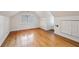 Spacious attic space with hardwood floors, large window, and ample closet space at 1046 S Mcdonough St, Decatur, GA 30030