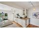Well-lit kitchen features granite counters, stainless appliances, and hardwood floors at 1046 S Mcdonough St, Decatur, GA 30030
