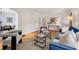 Comfortable living room with hardwood floors, stylish furniture, and seamless flow to the dining area at 1046 S Mcdonough St, Decatur, GA 30030