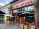 Exterior view of storefront, including outdoor seating at 1046 S Mcdonough St, Decatur, GA 30030
