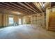 Unfinished basement with exposed framing and utilities provides a blank canvas for customization and expansion at 2 Silver Leaf Trl, Douglasville, GA 30134