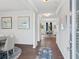 Open-concept entryway with hardwood floors, dining room, and natural light at 2 Silver Leaf Trl, Douglasville, GA 30134