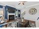 Living room with fireplace, tv, staircase and stylish design at 2 Silver Leaf Trl, Douglasville, GA 30134